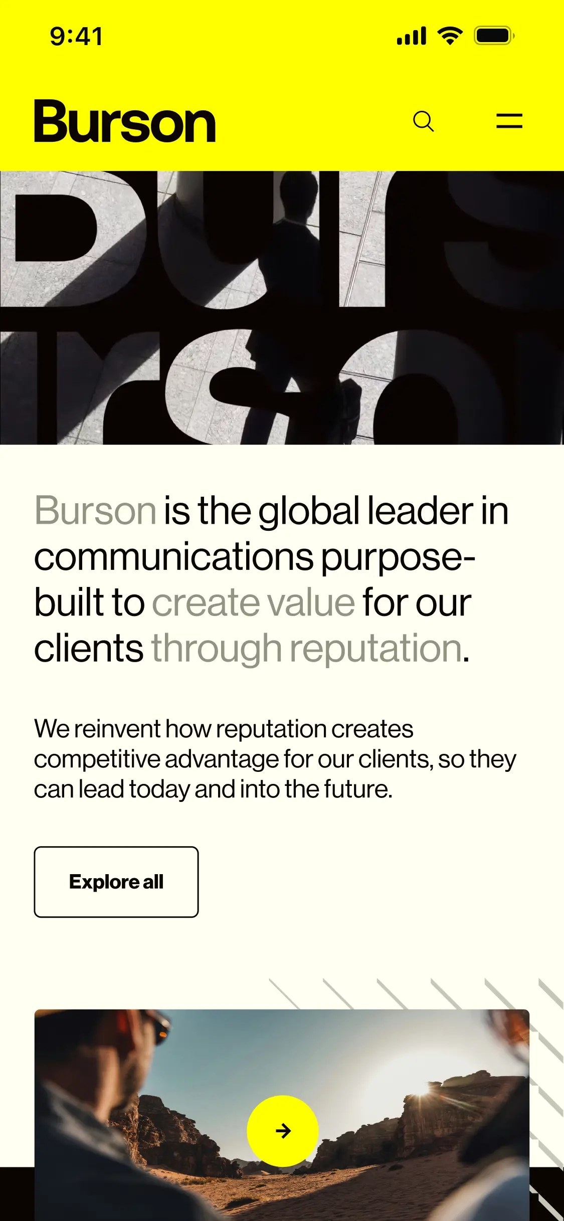 Screenshot of the Burson website homepage mobile-friendly design, displaying a paused animated banner, a title that reads "Burson is the global leader in communications purpose-built to create value for our clients through reputation", a "Explore" CTA button and a video player with a static image of a man outdoors. 