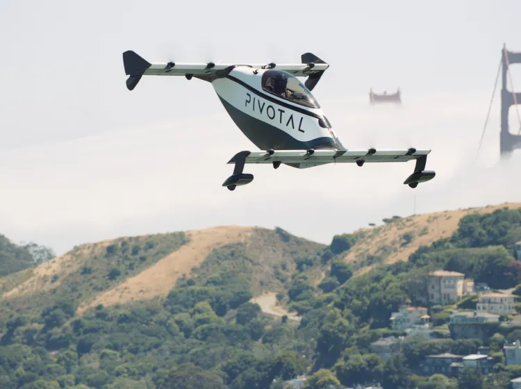 A Pivotal Helix eVTOL personal aircraft is seen flying near the Golden Gate Bridge