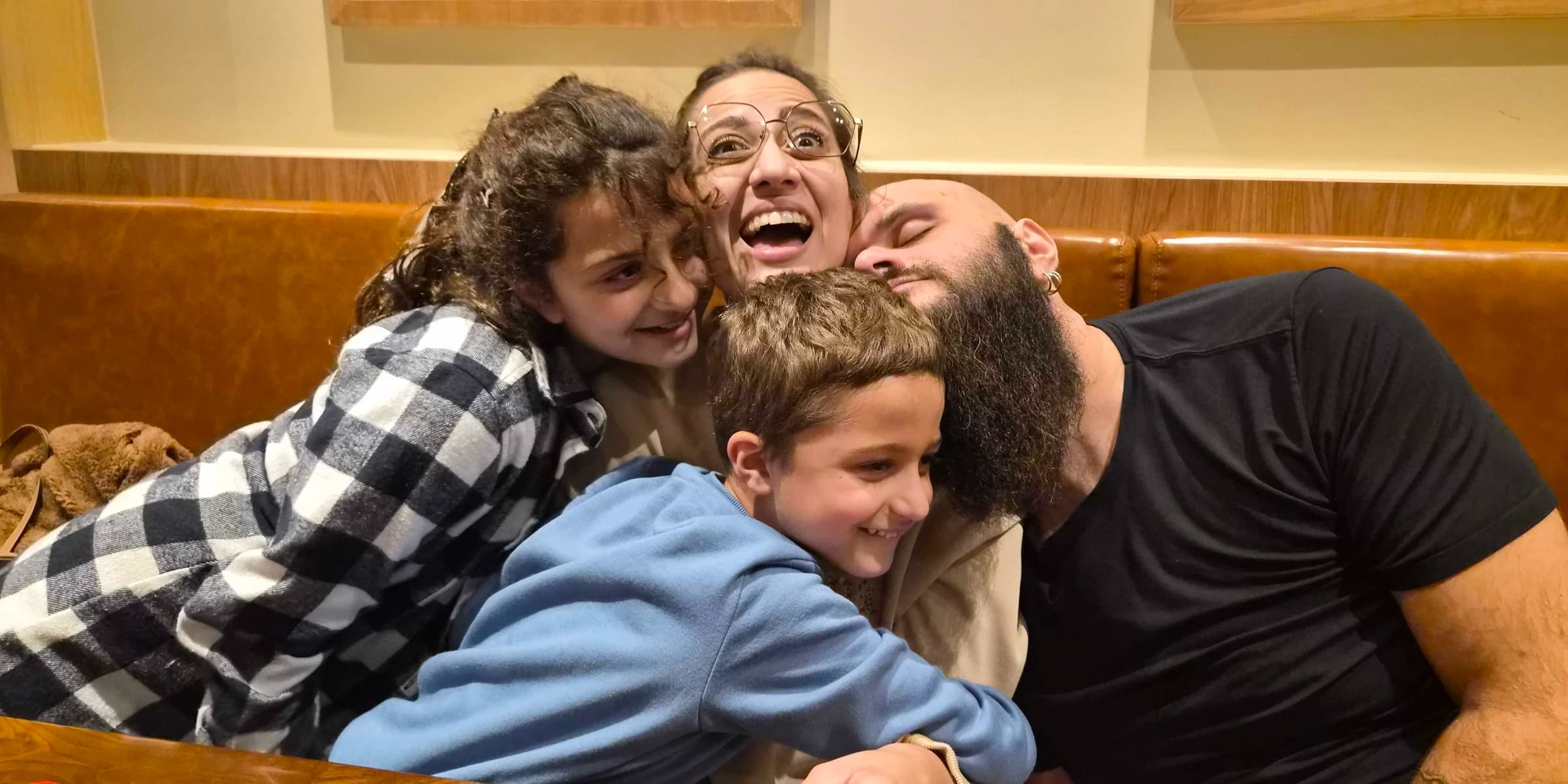 Stella with her husband and children