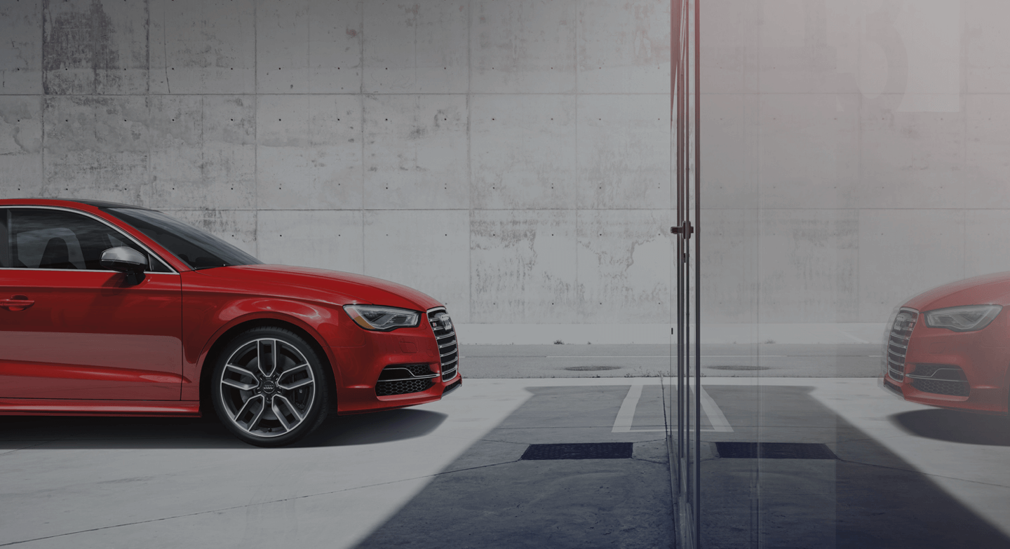 Red Audi A6 in a showroom